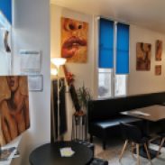 exposition de peinture sur bois de Coraline Van Butsele alias coco au restaurant le st antoine à Crépy en Valois.